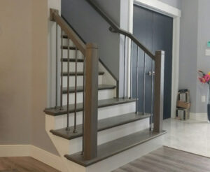 Install spindles (Iron Balusters Canada)